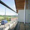 Glass balcony with unfinished decking